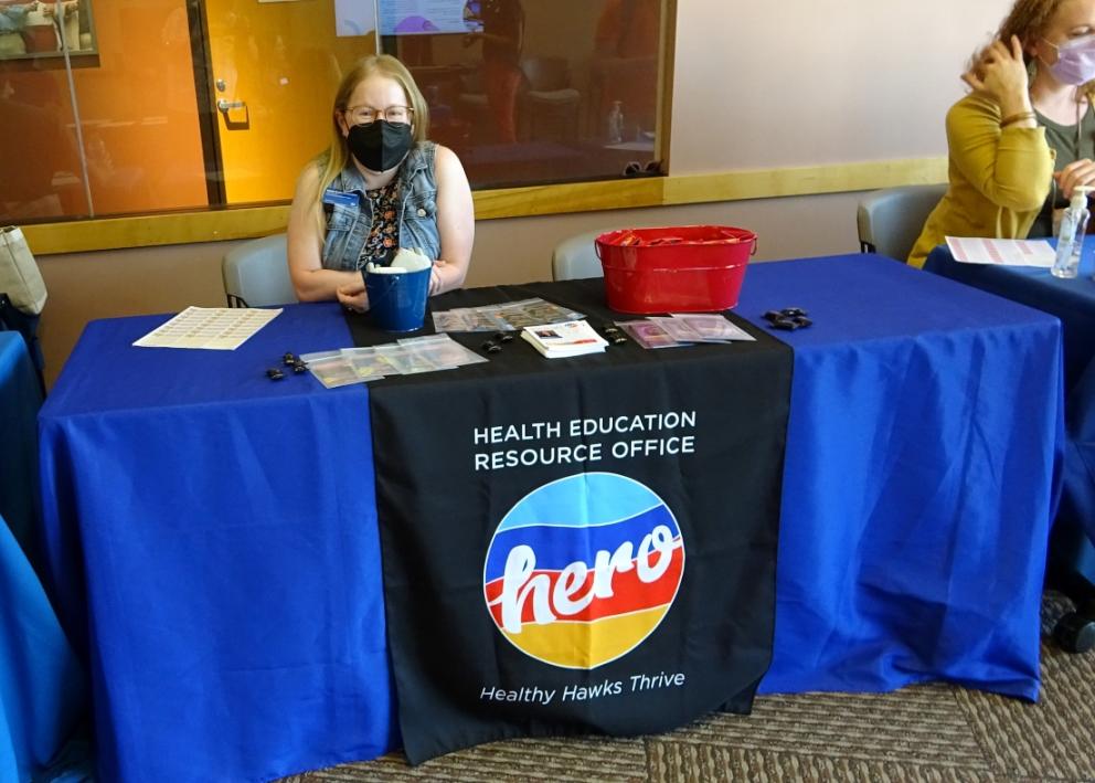 Staff with HERO tabling at resource fair